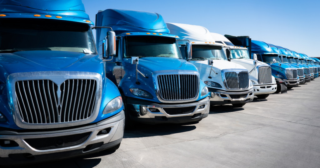  Blue semi-trucks in fleet row | Diesel ECM programming and diagnostics | Truck ECM service for fleet managers