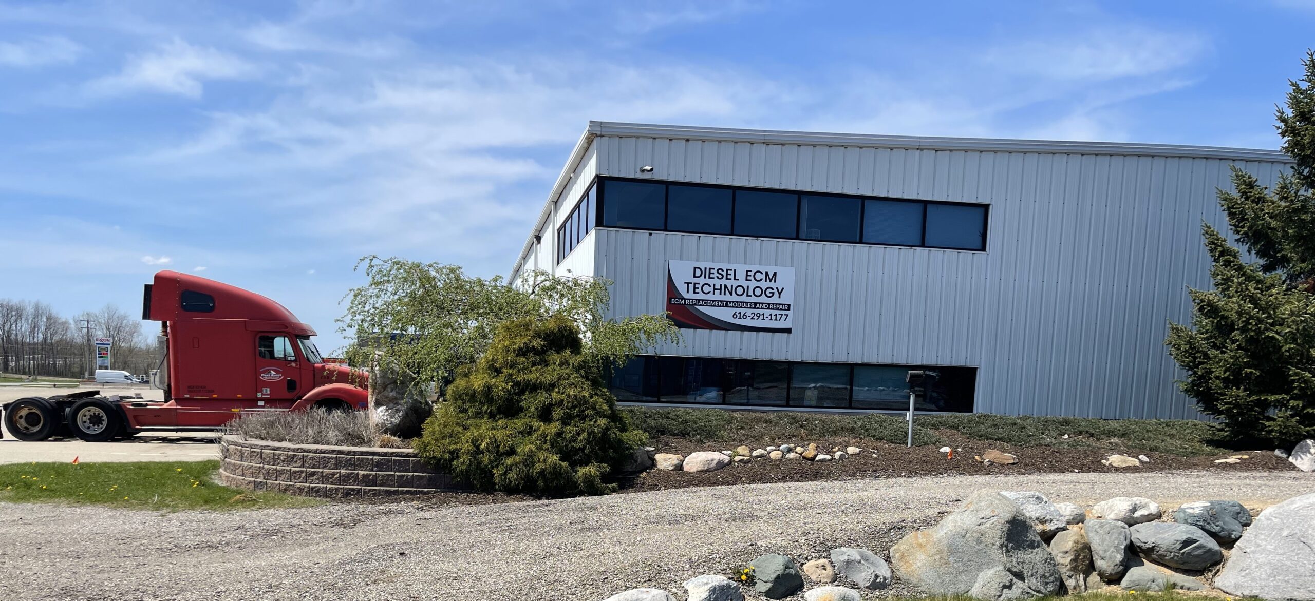 Diesel ECM Technology facility in Wayland Michigan with service truck on site for diesel ECM repair and programming to improve engine performance.